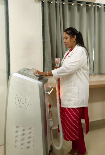 Clinical assistant operating advanced laser equipment