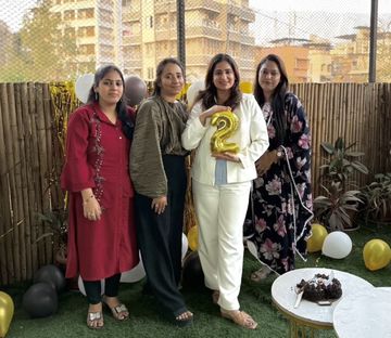 Dr. Sonia and team celebrating the clinic's second anniversary