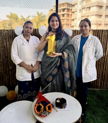 Dr. Sonia and team celebrating the clinic's first anniversary