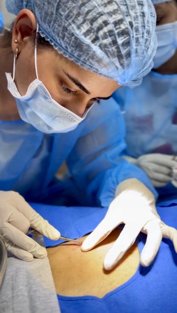 Close-up of a clinical skin suturing procedure