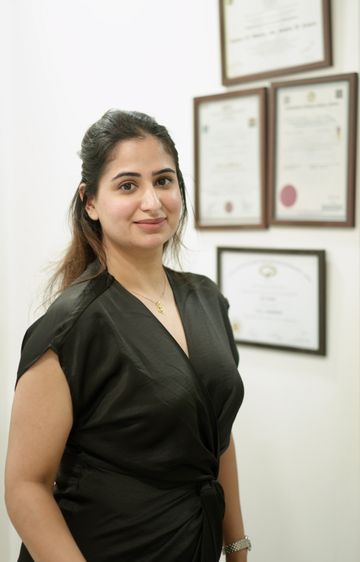 Dr. Sonia Nanavati with her framed medical qualifications