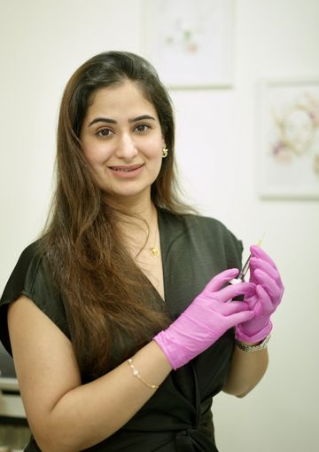 Dr. Sonia preparing an injectable treatment